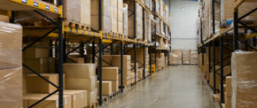 Warehouse aisle with stocked pallet racks